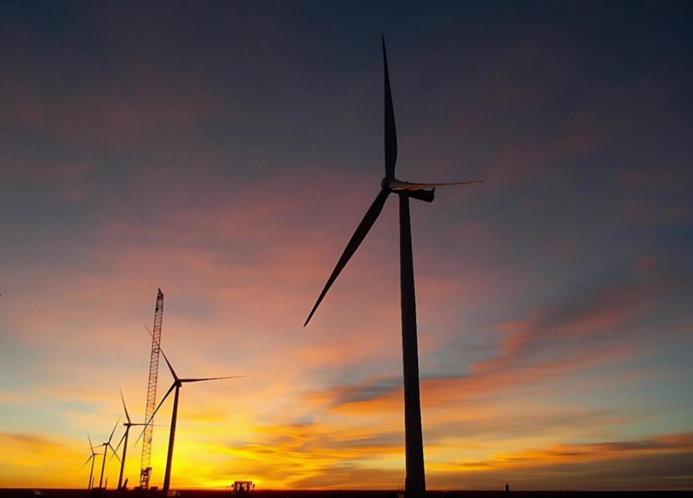 Student working with electrical control panel in training facility